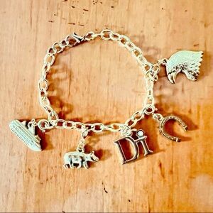 Diamonds International Gold Charm Bracelet